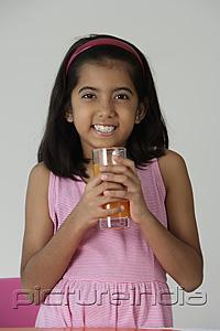 PictureIndia - Girl with glass of juice