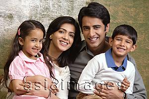 Asia Images Group - family of four smile at camera