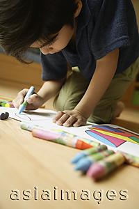 Asia Images Group - Little boy coloring