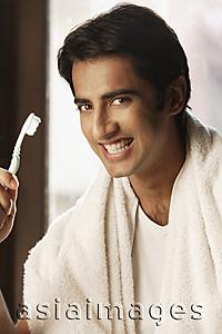 Asia Images Group - Man with toothbrush