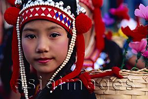 Asia Images Group - Thailand,Chiang Rai,Akha Hilltribe Girl Wearing Traditional Silver Headpiece