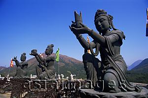 Asia Images Group - China,Hong Kong,Lantau,Chinese Goddess Statues at the Base of The Giant Buddha Statue at Po Lin Monastery
