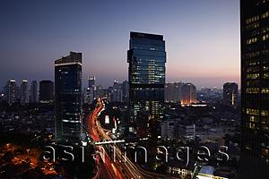 Asia Images Group - Evening view of CBD and skyscrapers along Jalan Jend Sudirman, Jakarta