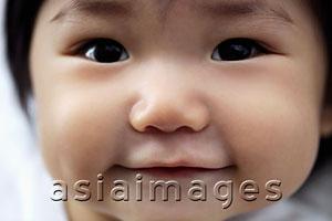 Asia Images Group - Close up of baby's face smiling