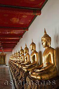 Asia Images Group - A row of Buddha Statues at Wat Pho, Bangkok, Thailand