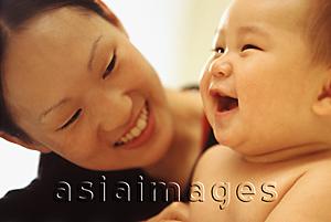 Asia Images Group - Mother looking at baby boy (3-9 months old) laughing