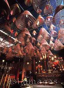 Asia Images Group - China, Hong Kong, Mid-levels, Hollywood Road, Man Mo Temple, incense coils with altar in background