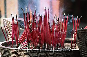 Asia Images Group - Malaysia, Penang, Joss sticks in temple urn