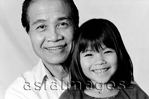 Asia Images Group - Mature man hugging young girl