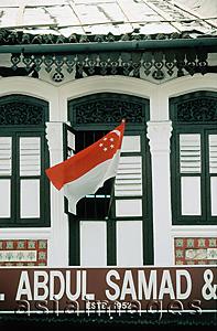 Asia Images Group - Singapore, an Arab Street shop flies a Singapore flag on National Day (August 9).