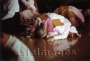 Asia Images Group - Myanmar (Burma), Yangon (Rangoon), A group of young Buddhist monks meditating at a meditation center.