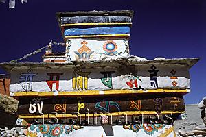 Asia Images Group - China, Szechuan (Sichuan), Kham region, Tibetan Buddhist Chorten decorated with Buddhist symbols.