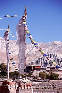 Asia Images Group - Nepal, Mustang, Prayer flags mark entrance to Tsarang monastery.
