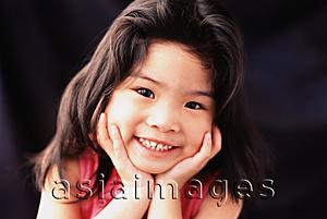 Asia Images Group - Young girl smiling, hands on chin