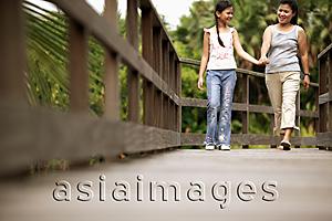 Asia Images Group - Mother and daughter, walking hand in hand