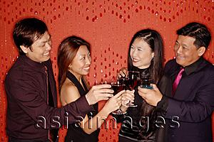 Asia Images Group - Couples toasting with wine glasses.