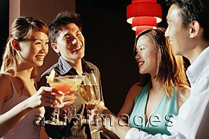 Asia Images Group - Couples with drinks, toasting