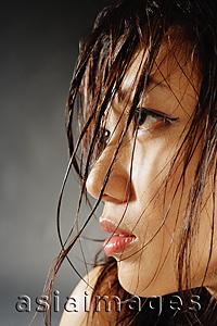 Asia Images Group - Young woman looking away, hair wet