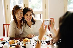Asia Images Group - Women posing for photograph