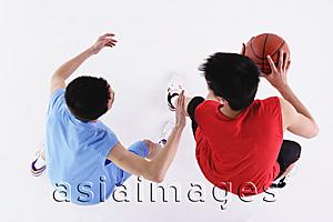 Asia Images Group - Two men playing basketball
