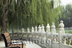 Asia Images Group - Empty park bench in Beihai park, China