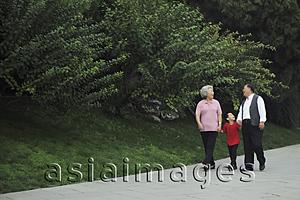 Asia Images Group - Older couple walking with grandson in the park