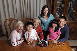 Asia Images Group - Three generation family playing games together