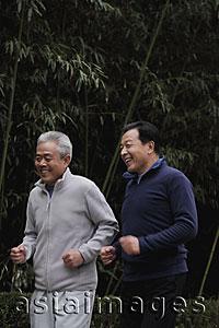 Asia Images Group - Two older men running outdoors