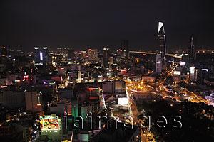 Asia Images Group - Aerial view at night of Ho Chi Minh city with Bitexco Financial Tower in the background, Vietnam