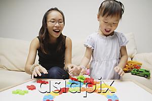 AsiaPix - Mother and daughter, playing with toys, smiling