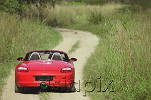 AsiaPix - Red sports car on rural road